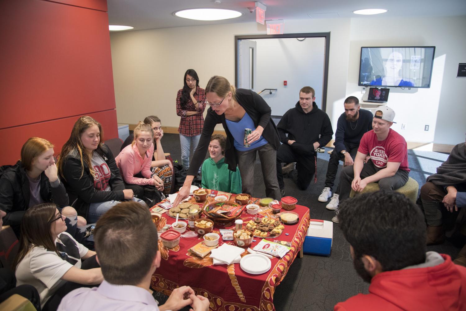 Biology professor Angela Dassow led one of her classes in an unusual dining experience for Halloween: a spread of goodies made with insects.